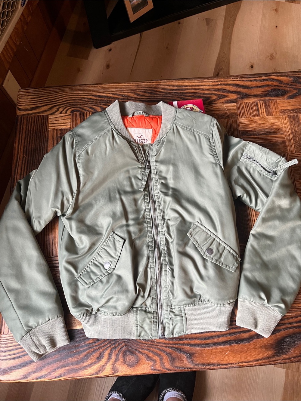 Hollister Womens cropped Olive Green Puffer Jacket with Bright Orange Lining